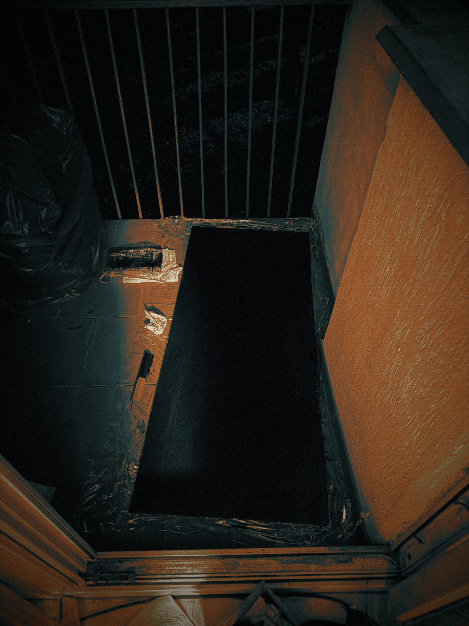 a freshly coated black surface at night